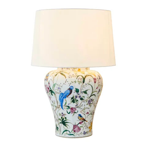 Our Raffles is charming large oriental ceramic base table lamp and has glazed ceramic base in the classic ginger jar style. The lamp is delicately hand painted with bird and leaf motif on ivory white background